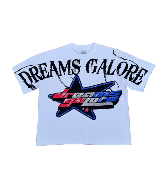 White t-shirt with 'Dreams Galore' logo on grass